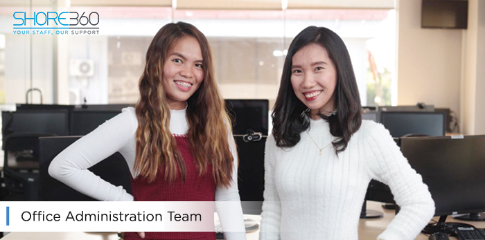 The office administration team of Shore360, Inc., two female employees smiling, and ready to supporting the outsourcing agency.