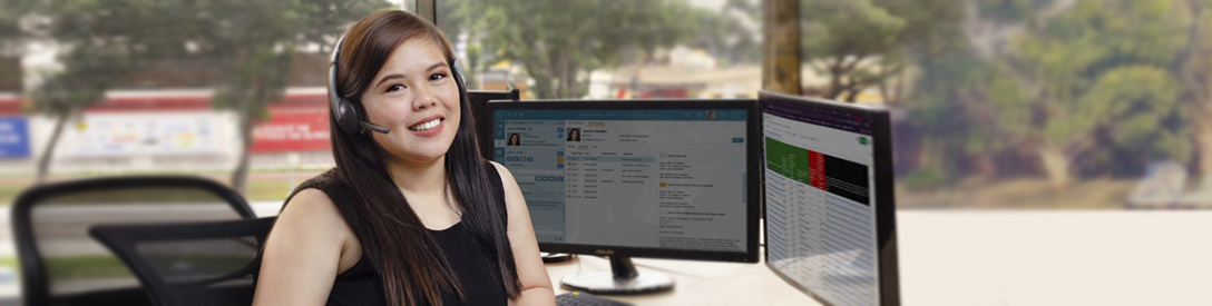 An offshore staff at Shore360, Inc. wearing black dress and smiling.