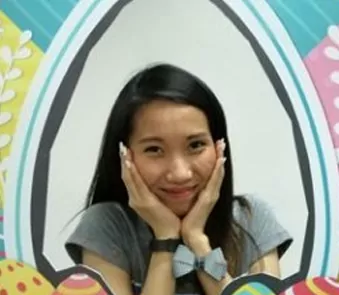 A photo of a Shore360, Inc, employee participating in one of the events of the company by posing in a photo booth.
