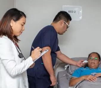 An image of a Shore360 employee being examined at one of the medical facilities of the company.