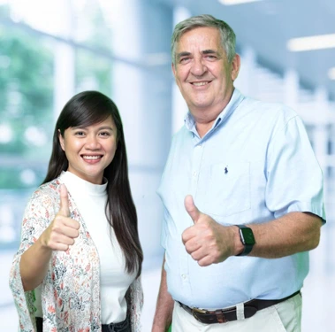 Shore360, Inc. President, Lee Shaddock with an employee smiling with a thumbs up.