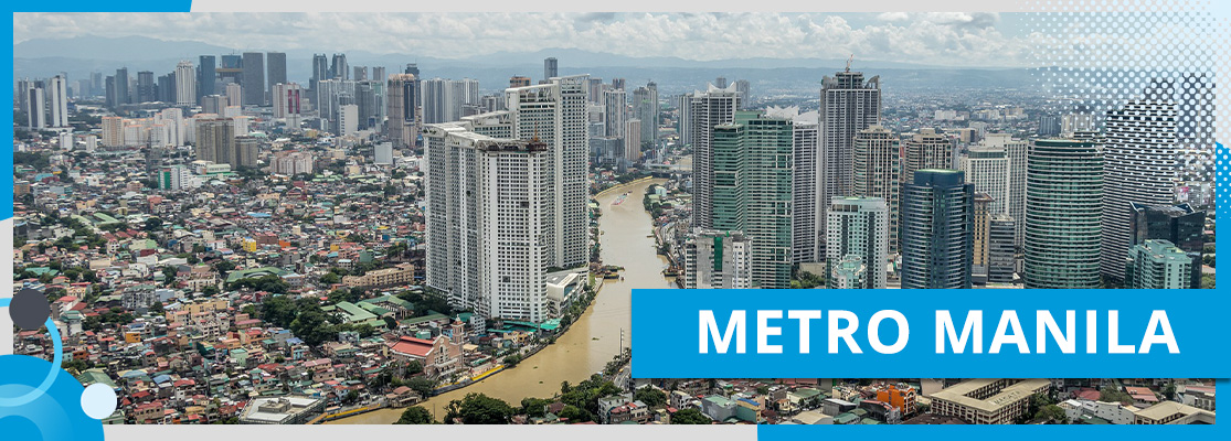 Aerial view of Metro Manila, a megacity in the Philippines, showcasing its skyscrapers, river, and bridge.