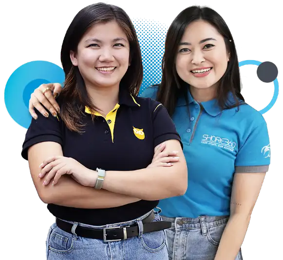 Two smiling professionals wearing branded polo shirts with Shore360 and Owl logos, showcasing a friendly and approachable work culture.