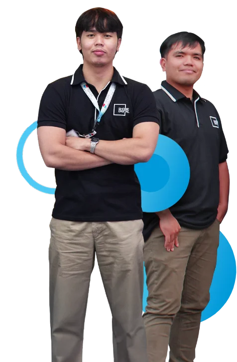 Two Shore360 team members standing confidently in branded uniforms, showcasing professionalism and expertise.