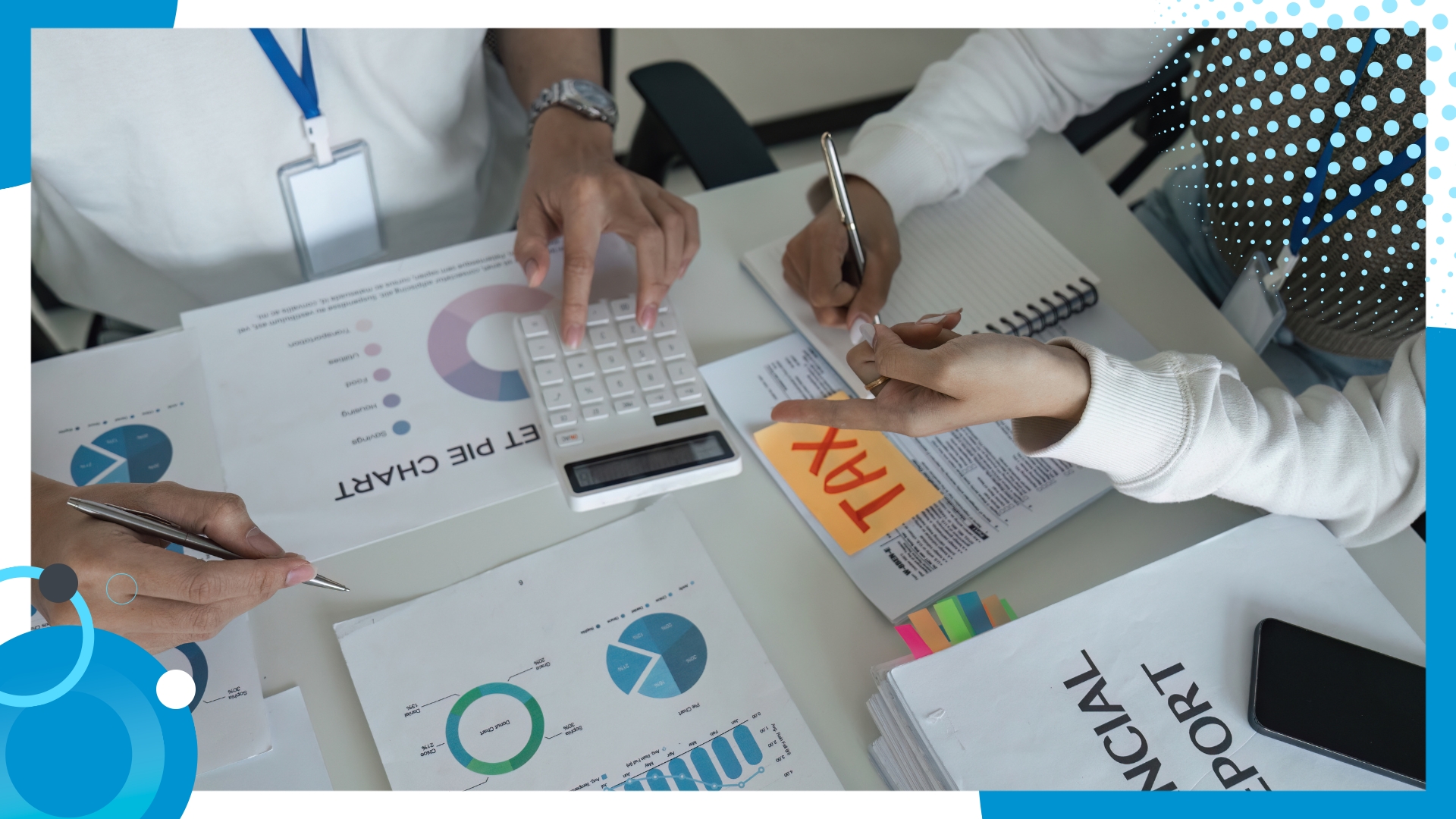 Close-up of people calculating taxes with documents, charts, and a TAX note on a desk.
