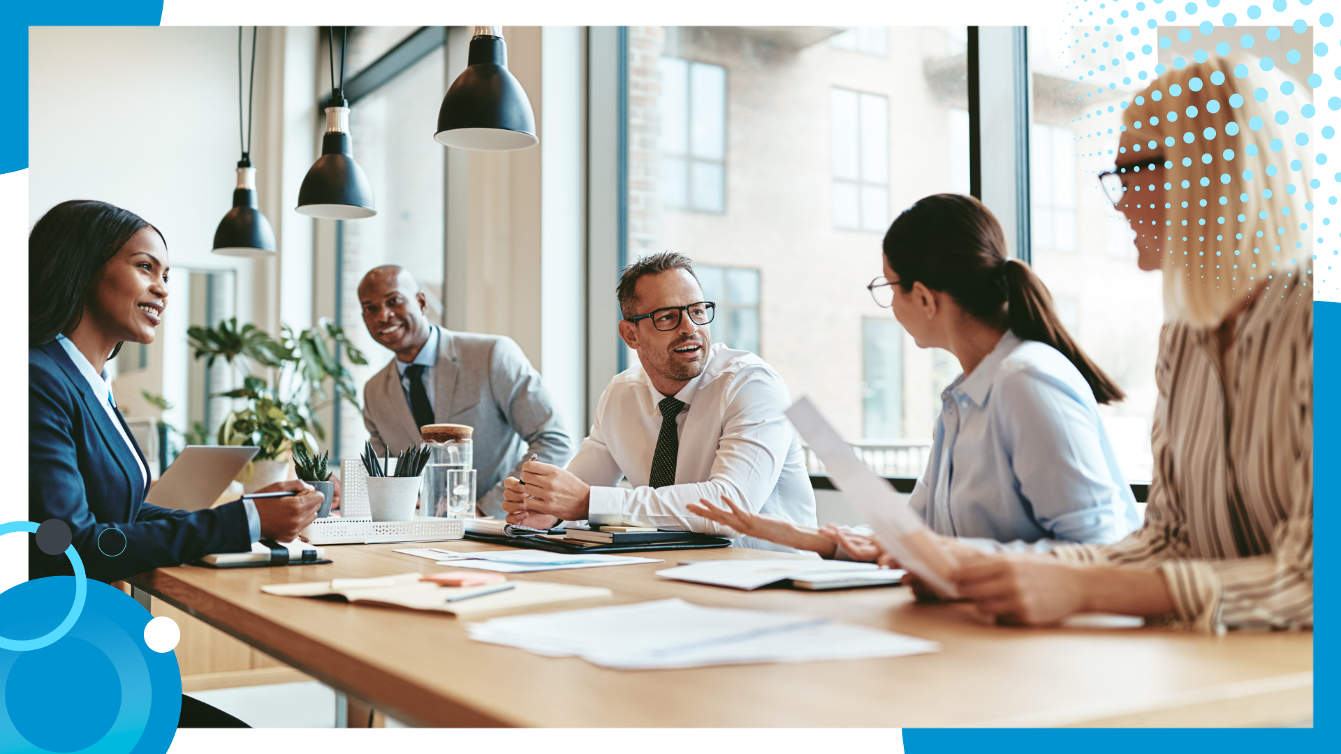 Diverse business team having a discussion around a conference table