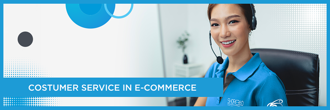 Smiling female customer service representative in Shore360 uniform wearing a headset at her workstation