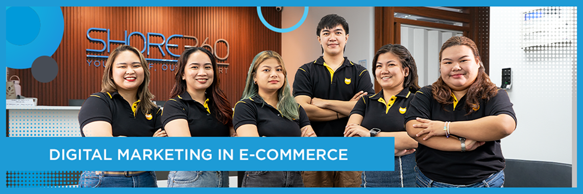 Digital marketing team in matching Shore360 polo shirts posing together at the company office reception