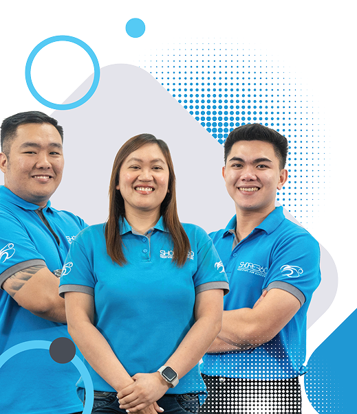 Three Shore360 staff members in blue uniforms smiling and standing confidently against a modern abstract background
