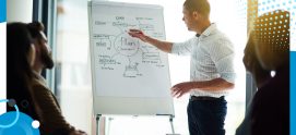 A professional analyzing financial icons such as handshake agreements, dollar growth, and teamwork within speech bubbles, representing key strategies for financial planning in offshore operations.